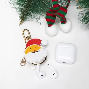 Cute Santa Claus cartoon earphone case pendant with gold zipper and festive decor