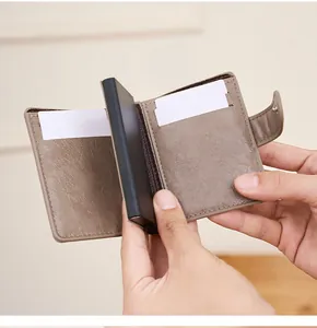 Détails du portefeuille RFID avec porte-cartes pop-up et cuir marron texturé