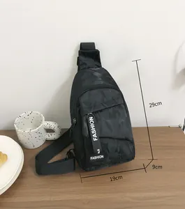Detailed view of black camo nylon chest bag with fashion strap and 29x19x9cm dimensions