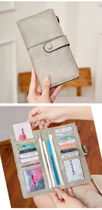 Detail of taupe RFID blocking long wallet showing multi-card slots and zippered pocket