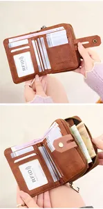 Detail view of RFID protected leather wallet showing multiple card slots and zipper pocket