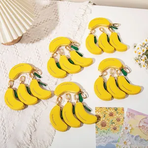 Mini porte-monnaie banane en cuir PU avec boucle dorée et fermeture à glissière