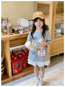 Kids grey cartoon cat tee and white layered ruffle shorts set with pink bow crossbody bag