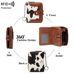 RFID blocking wallet with cow print patchwork, card slots, and keychain chain