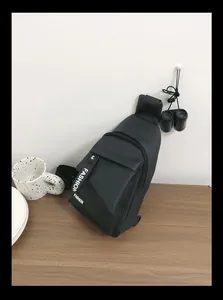 Outdoor sports chest bag featuring adjustable strap and fashion lettering on black nylon