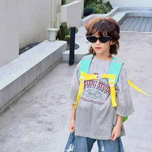 Kids color-block backpack in mint green and yellow with chest strap for preschool school