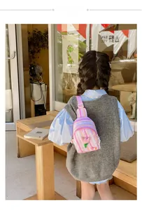 Outdoor shot of a girl wearing a striped canvas crossbody bag with 3D tulip decor