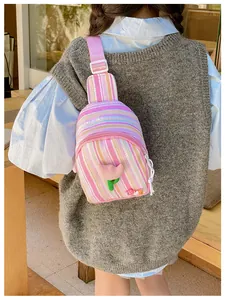 Detail of pink striped kids crossbody bag with 3D tulip flower and LOVE embroidery