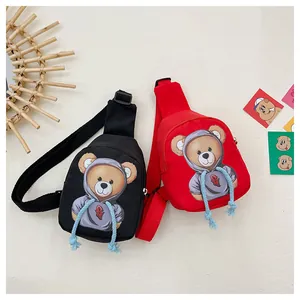 Detail of cartoon bear print on kids chest bags with decorative blue drawstrings