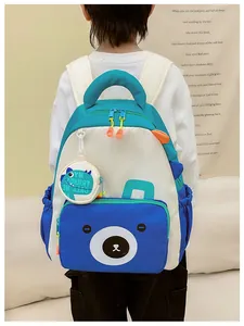Detail of children's dinosaur backpack with padded straps and water bottle pocket