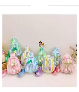 Detail of colorful striped crossbody bags for girls with tulip and grape decorations