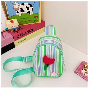 Detailed view of colorful vertical stripes with red floral accent and LOVE charm