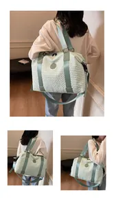 Detail view of large capacity mint green travel bag with ripple texture and logo