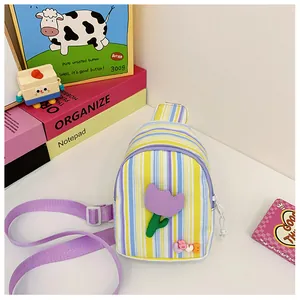 Detail of colorful striped girls chest bag featuring 3D tulip and LOVE decoration