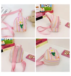 Detail views showing striped fabric kids crossbody bag with floral decor and adjustable strap