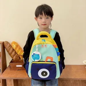 Kids colorful dinosaur backpack with black bear print and cute dinosaur accessory