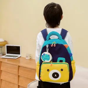 Kids dinosaur backpack with bear print and cute round dinosaur coin purse pendant