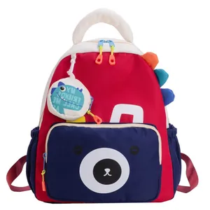 Kids dinosaur backpack in red and navy nylon with bear print and coin pouch