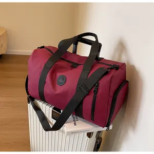 Macro detail of high-density burgundy travel bag with specialized shoe compartment