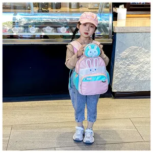 Pink rabbit theme backpack for children featuring cute cartoon face and matching small pouch