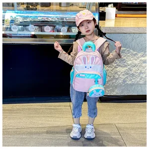 Toddler girl wearing cute bunny backpack with matching mini pouch and 3D ears