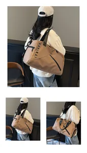 Detalle de bolsa de viaje marrón con asas negras y costuras geométricas