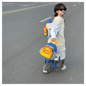 Detail showing cute 3D yellow lion cartoon design on toddler backpack with Leon text