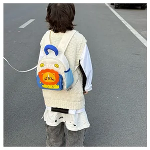 Detail of toddler backpack with cartoon lion design and safety anti-lost leash feature