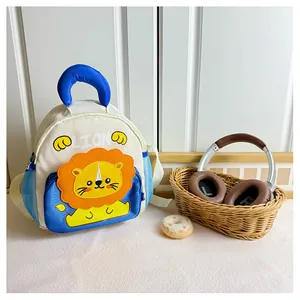Detailed view of kids cartoon lion backpack featuring canvas material and side mesh pocket