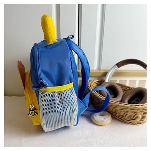 Detail view of the breathable mesh back and yellow side pocket on the lion cartoon backpack