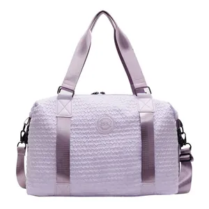 Light purple travel bag with wave texture and adjustable strap for sports fitness