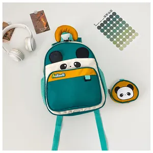 Detail view of cartoon panda backpack set with matching round coin purse for kids