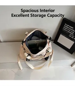 Top view of large capacity cream tote bag showing spacious interior with daily items