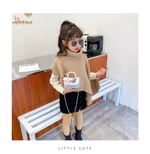 Détail du sac en tweed pour filles avec poignée en perles et décor de poupée lapin rose