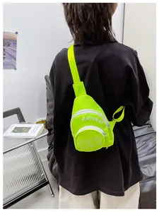 Detailed back view showing fluorescent green nylon chest bag with letter print and strap