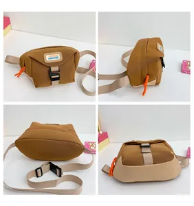Multi-angle view of a beige and brown canvas waist bag with orange pull cords and buckle