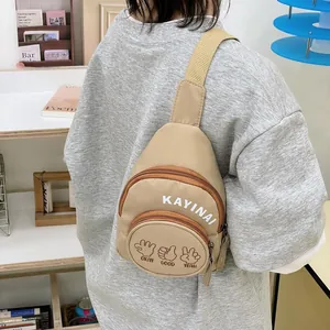 Khaki canvas crossbody chest bag for kids featuring letter print and hand gesture patterns