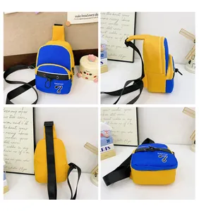 Detailed views of blue and yellow contrast crossbody bag with adjustable strap