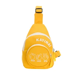 Vibrant yellow canvas crossbody chest bag for kids featuring playful white hand gestures