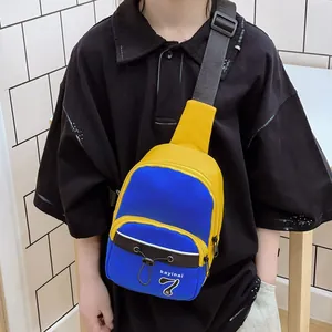 Blue and yellow contrast mini crossbody chest bag with adjustable black strap for teens