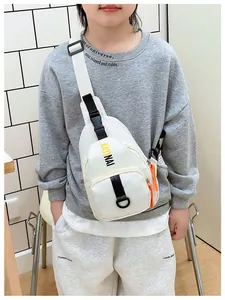 Kids white crossbody chest bag with adjustable black strap and orange zipper accents