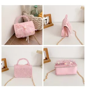 Detail view of pink lace girls handbag with organza bow and pearl accent from four angles
