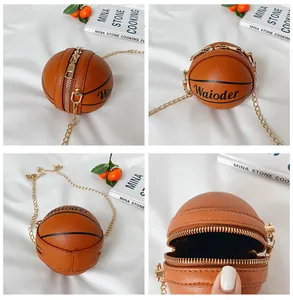 Detail of basketball shaped mini crossbody bag with pebble grain PU leather and gold zip