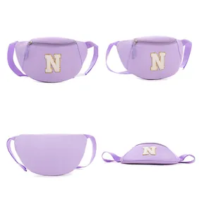 Detailed views of lavender fanny pack with white chenille letter N embroidery and gold trim