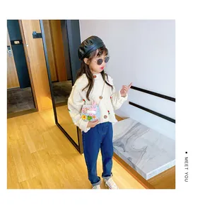Girl's knitted cardigan with cherry detail and blue floral rabbit crossbody bag