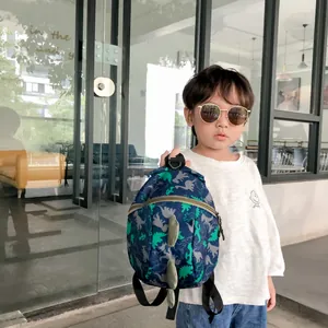 Cartoon dinosaur print toddler backpack in navy blue with 3D decorative back fins