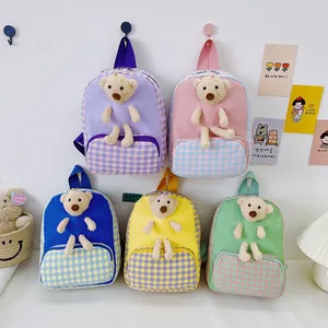 Cute cartoon kids backpack with 3D plush bear and checkered pockets in five pastel colors