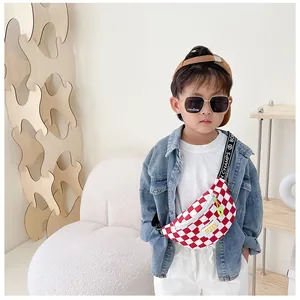 Close-up of red and white checkerboard kids chest bag with adjustable letter strap