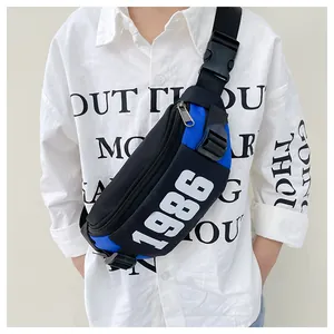 Kids streetwear chest bag in black and blue nylon with bold 1986 numeric print