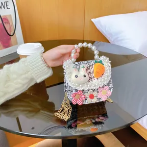 Cute kids tweed crossbody bag with plush rabbit decor and pearl beaded handle